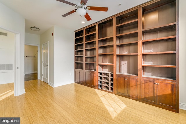 unfurnished living room with light wood finished floors, baseboards, visible vents, a ceiling fan, and recessed lighting