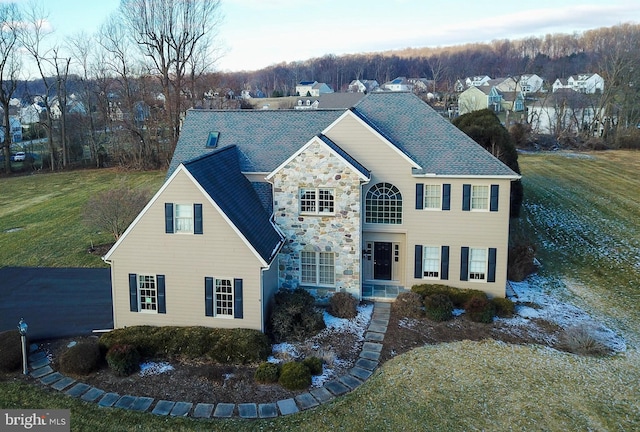 view of front of property with a front lawn