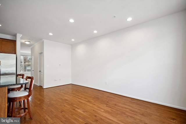 interior space with hardwood / wood-style floors