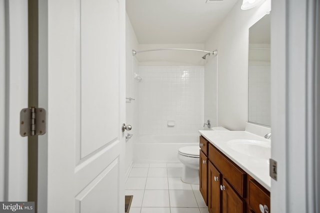 full bathroom featuring tile patterned flooring, vanity, tiled shower / bath combo, and toilet