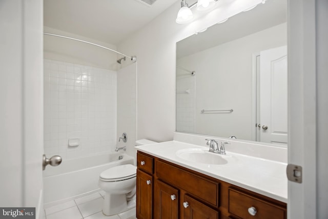 full bathroom featuring tile patterned flooring, vanity, toilet, and tub / shower combination