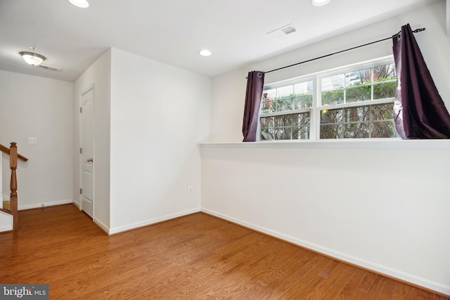 empty room featuring light hardwood / wood-style floors