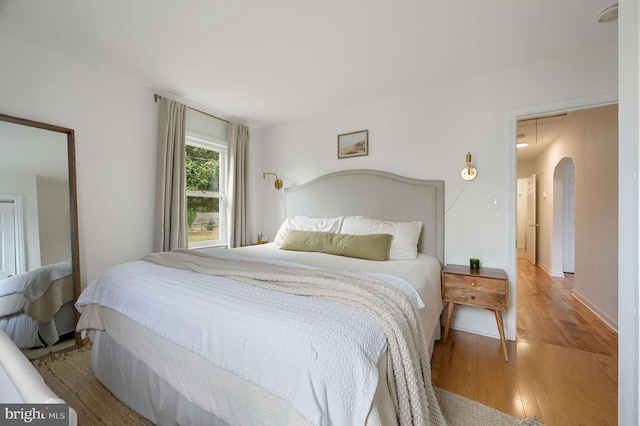 bedroom featuring wood-type flooring