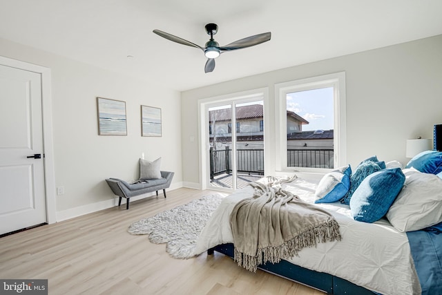 bedroom featuring ceiling fan, light wood-type flooring, and access to outside