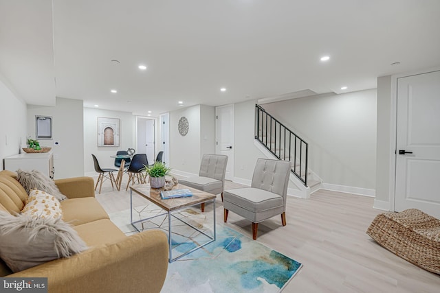 living room with light hardwood / wood-style floors