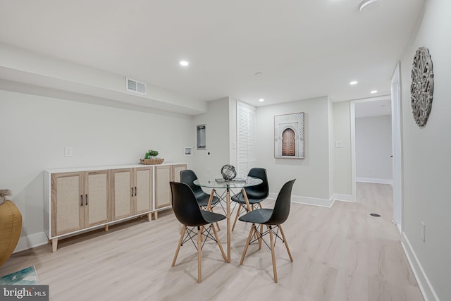 dining room featuring light hardwood / wood-style flooring