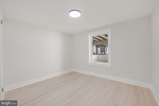 empty room featuring light hardwood / wood-style floors