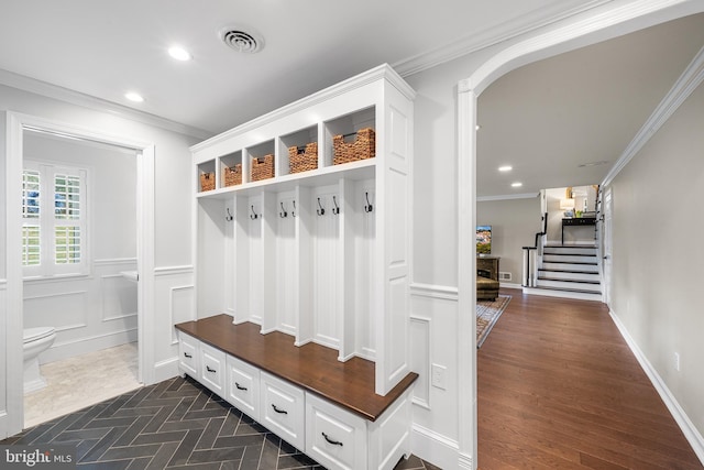 mudroom with crown molding