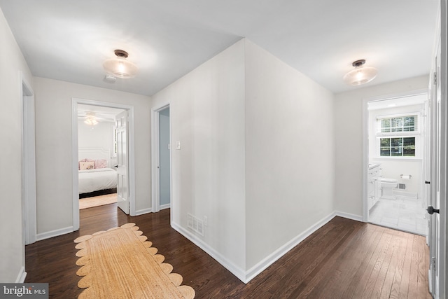 hall featuring dark hardwood / wood-style flooring