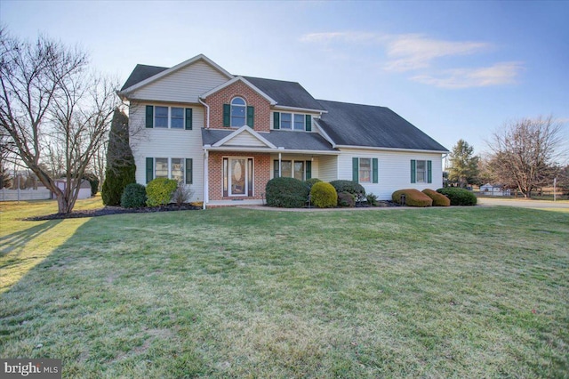 view of front of home featuring a front yard