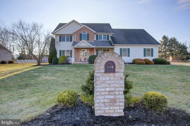 view of front of home featuring a front yard