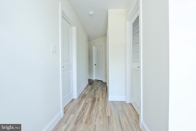 hall featuring light hardwood / wood-style flooring