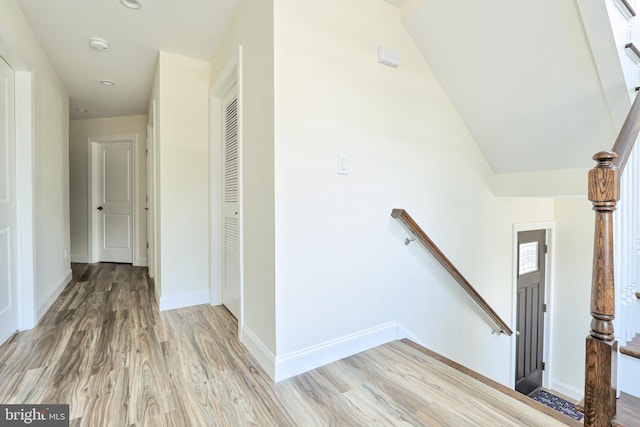 stairway featuring hardwood / wood-style floors