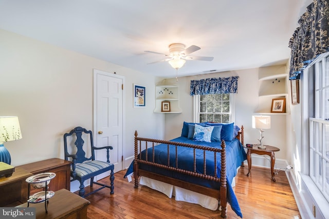 bedroom featuring ceiling fan and wood-type flooring