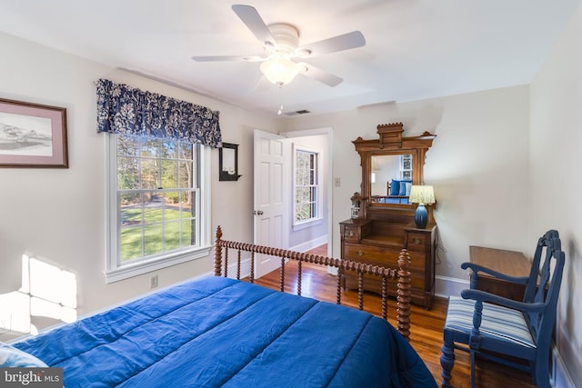 bedroom featuring hardwood / wood-style floors and ceiling fan