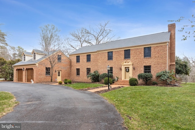 view of front of home with a front lawn