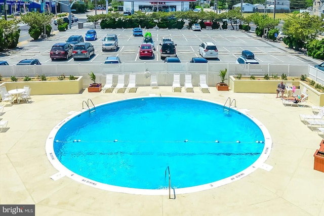 view of pool with a patio