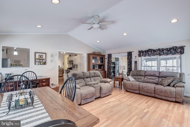 living room with recessed lighting, light wood-type flooring, lofted ceiling, and ceiling fan