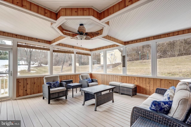 sunroom / solarium with ceiling fan