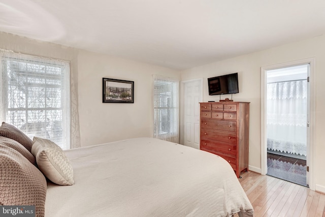 bedroom with hardwood / wood-style flooring