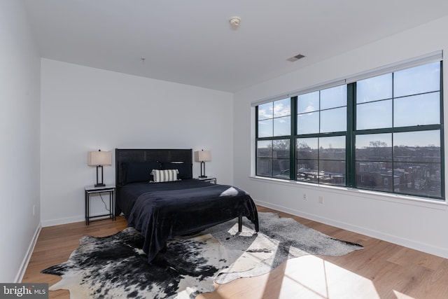 bedroom featuring hardwood / wood-style floors