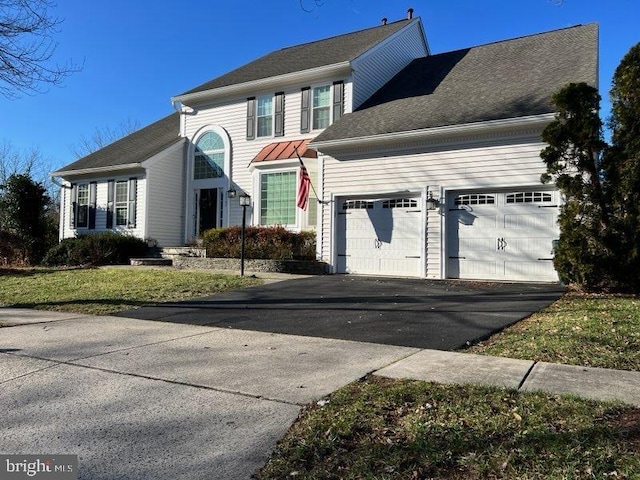 view of front of house with a garage