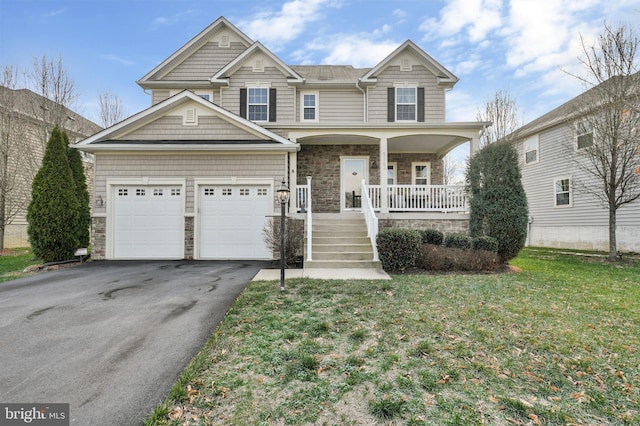 view of front of home featuring a porch and a front lawn