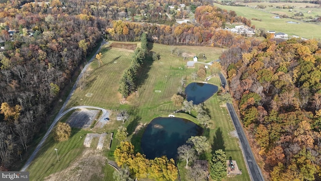 bird's eye view with a water view and a rural view