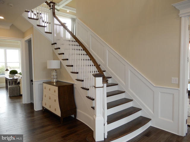 staircase featuring hardwood / wood-style flooring