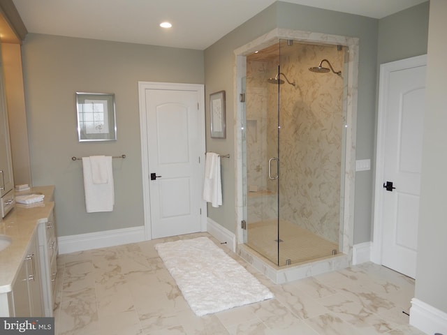 bathroom with vanity and walk in shower