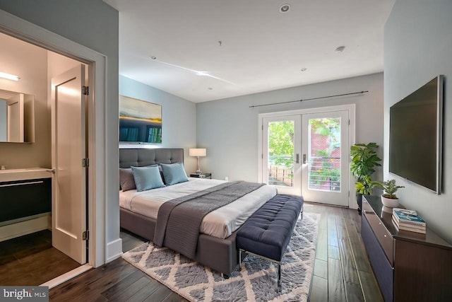 bedroom featuring access to outside, french doors, and dark wood-type flooring