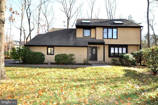 view of front facade with a front lawn