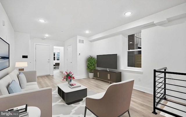 living room featuring light wood-type flooring