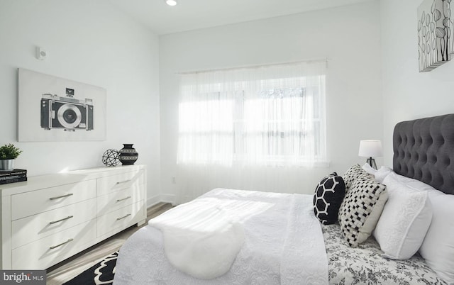 bedroom featuring light hardwood / wood-style flooring