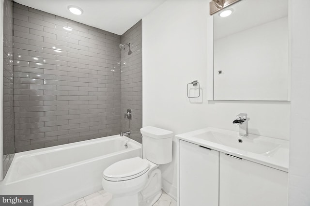 full bathroom with tiled shower / bath combo, toilet, and vanity