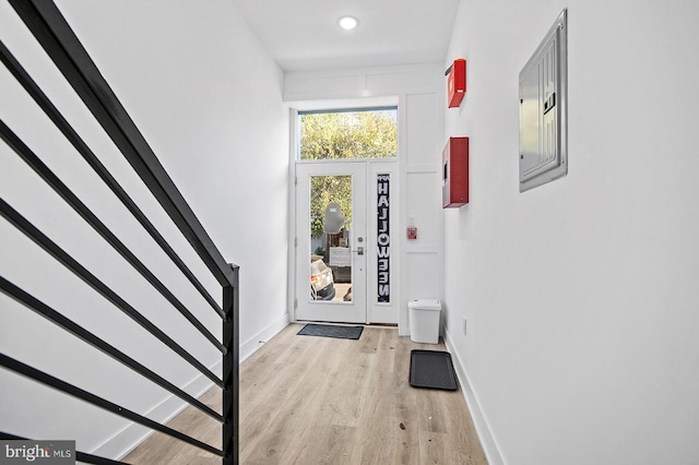 entrance foyer featuring electric panel and light wood-type flooring