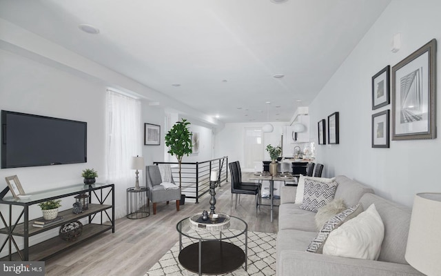 living room featuring light wood-type flooring