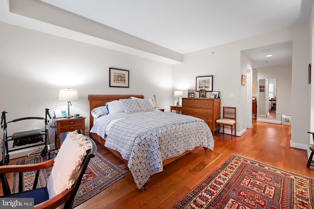 bedroom featuring wood-type flooring