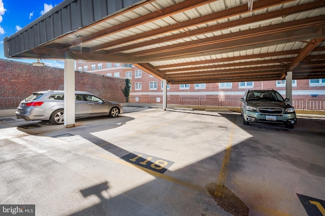 view of vehicle parking featuring a carport