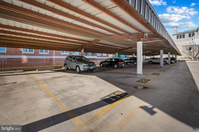 view of vehicle parking with a carport