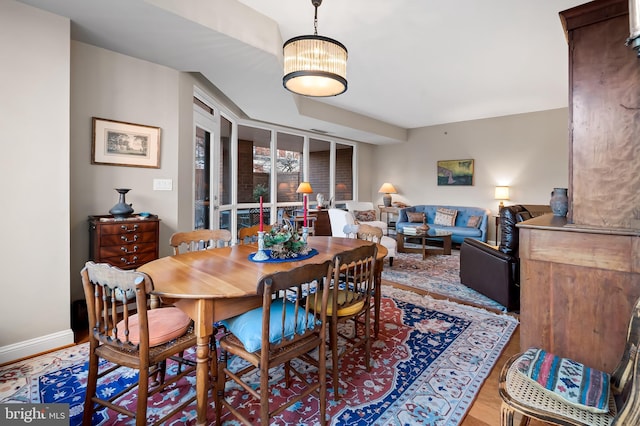 dining room featuring wood-type flooring