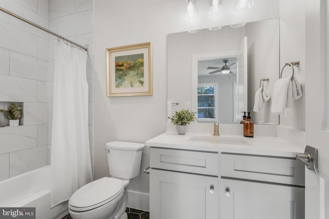 full bathroom with ceiling fan, vanity, shower / bath combo, and toilet