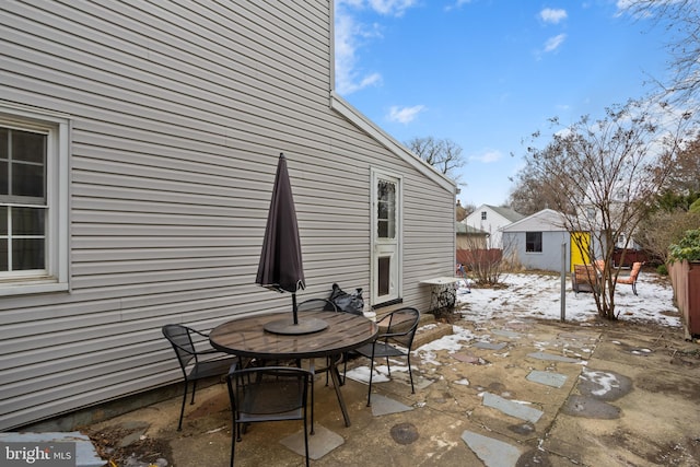 view of snow covered patio