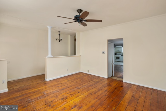 unfurnished living room featuring ceiling fan, crown molding, and hardwood / wood-style flooring