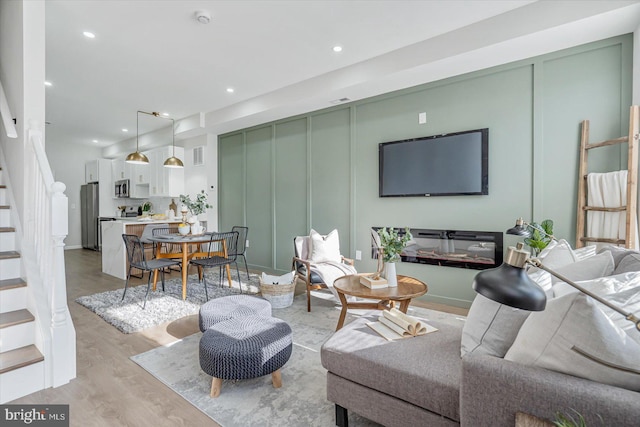 living room featuring light hardwood / wood-style flooring