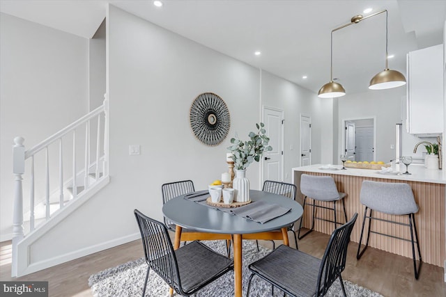 dining room with dark wood-type flooring