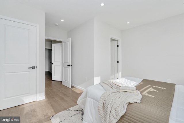 bedroom featuring light hardwood / wood-style flooring