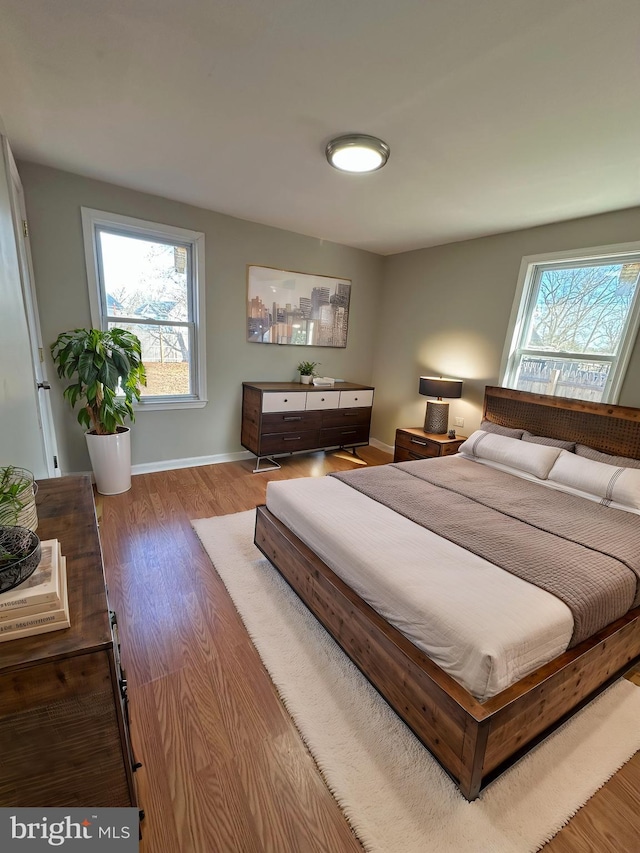 bedroom featuring hardwood / wood-style flooring