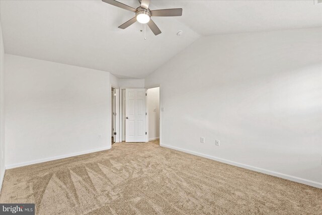 unfurnished room with carpet floors, ceiling fan, and lofted ceiling