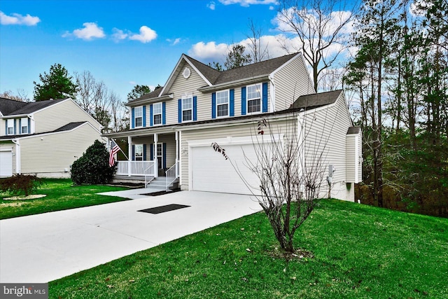 view of front property featuring a front yard, a porch, and a garage